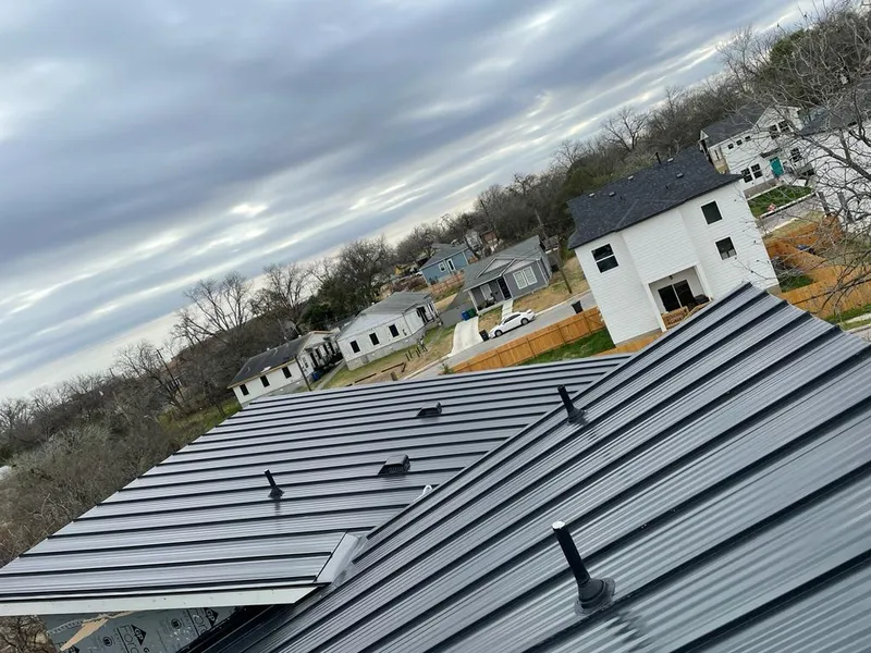 Standing seam metal roof panels with vents for Skylight Repair in Iowa Colony